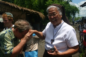 Ken McGrath, Gifts-In-Kind Coordinator for CHRF greets a happy Mother Joan in the Philippines.