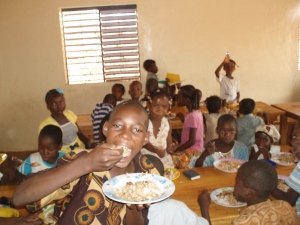 Some of the children with a very healthy and nutritious meal! 