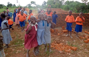 The children celebrating their new building!