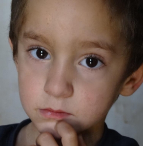 Families must flee the refugee camps where innocent children like this boy are not safe. 